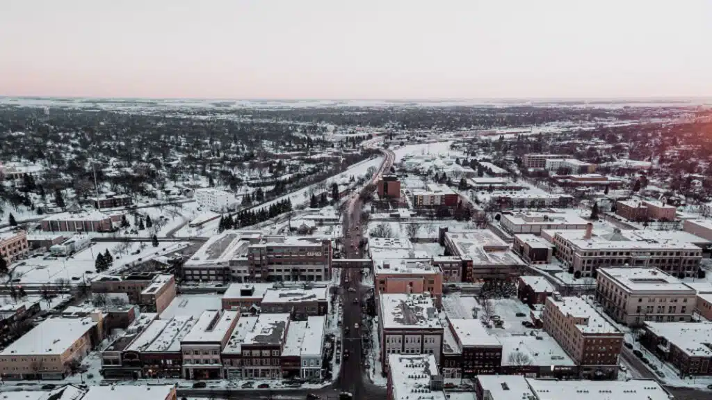 View of Grand  Forks from Above with snow covered roofs 