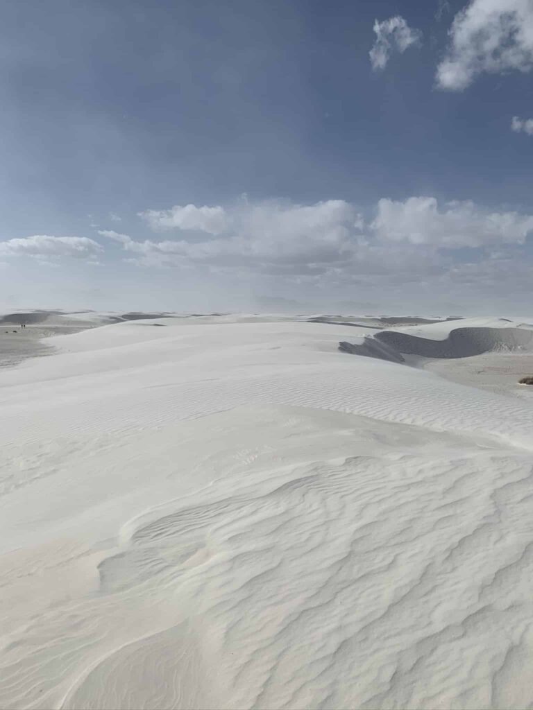 Endless white sand dunes and blue skies